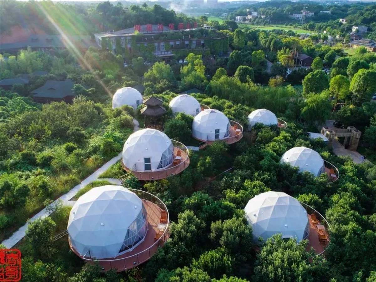 12 White PVC Fabric Eco Dome Tents, Deep Forest Geodesic Dome Resort